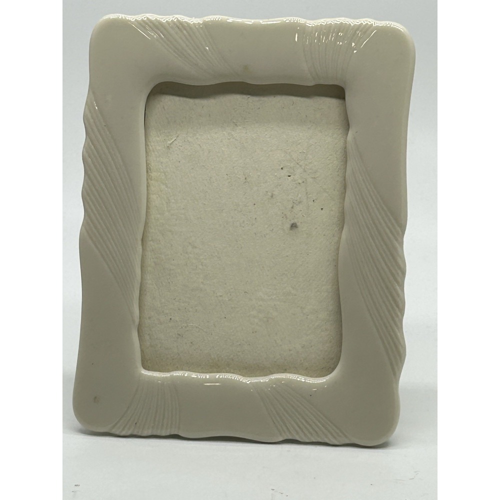 Lenox USA Porcelain Ivory Frame. 5x7 with a 3.5 X 4.5 Opening Perfect Condition
